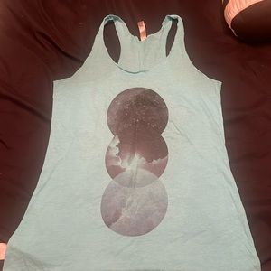 Light blue racerback tank with planets.